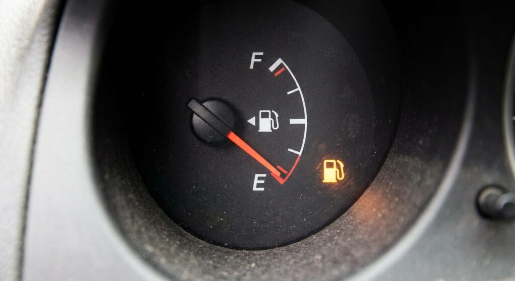 A GIF of a car sputtering and stopping on the highway. Or a picture of a fuel gauge on empty.
